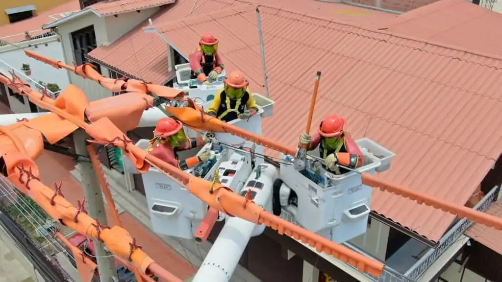 Live line maintenance with aerial basket
